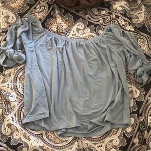 This is a beautiful blue, flowy shirt...